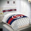 Best Gucci Golden Logo With Vintage Web In Black Background Bedroom Set
