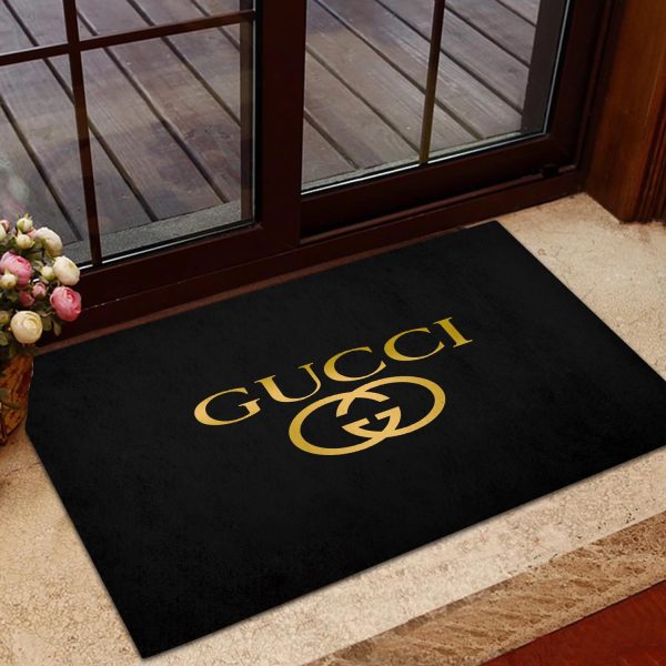 Gucci Golden Logo In Black Background Doormat