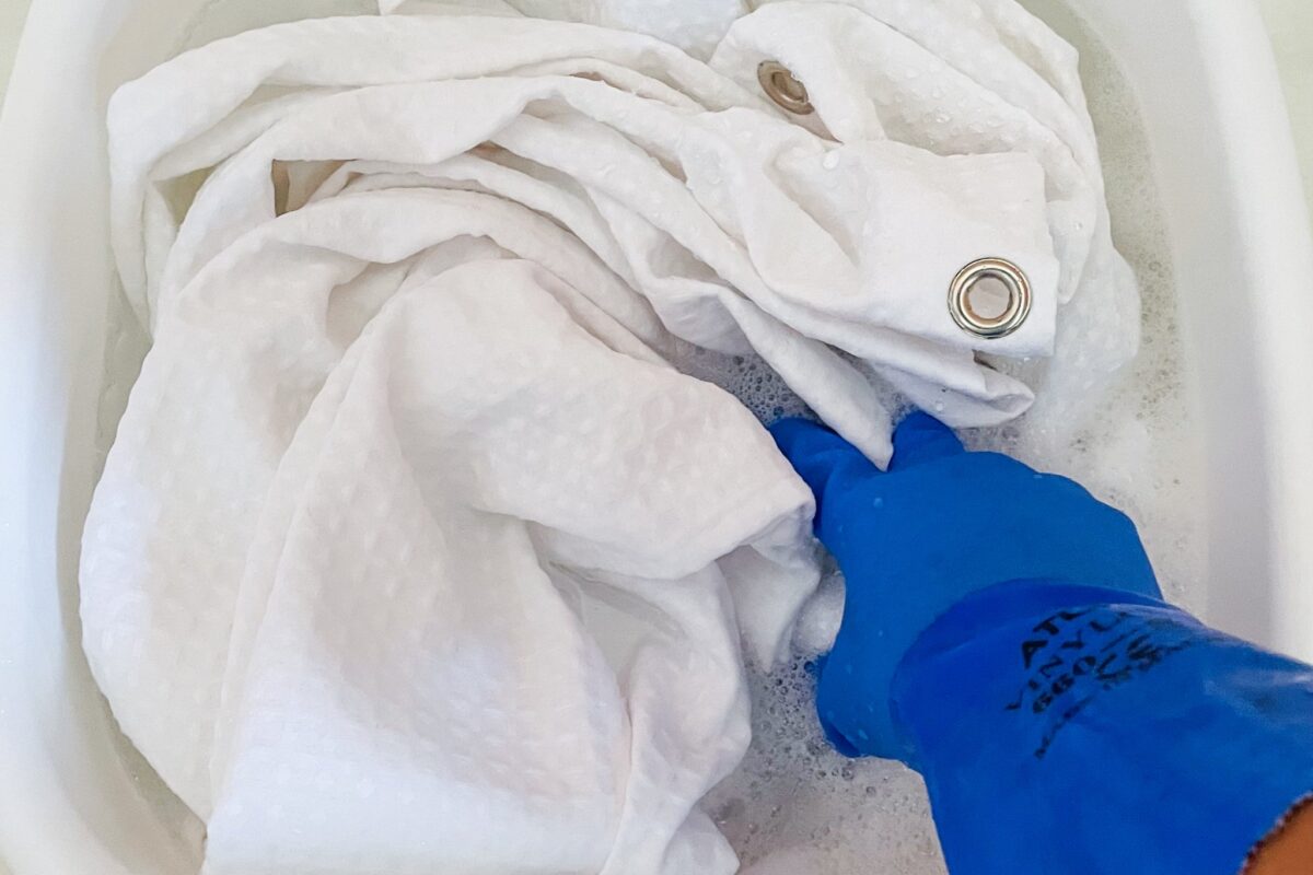 how to clean shower curtain liner