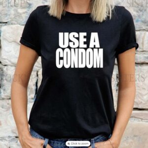 Rihanna wearing brand Savage X Fenty Use a condom T-shirt
