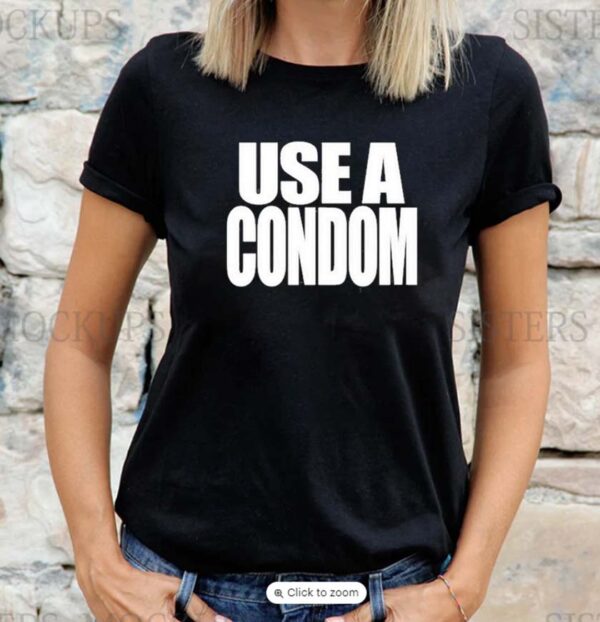 Rihanna wearing brand Savage X Fenty Use a condom T-shirt