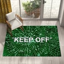 Keep Off on Broken Green Glass Rug