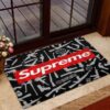 Supreme Gun In Black Rifle Background Doormat