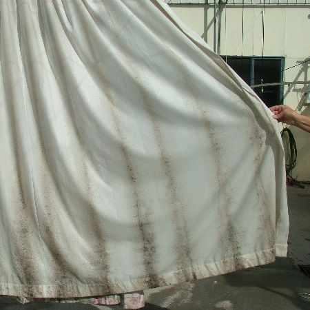 how to clean mold from shower curtain